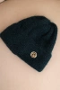 Women's winter fluffy hat with decorative button sea color