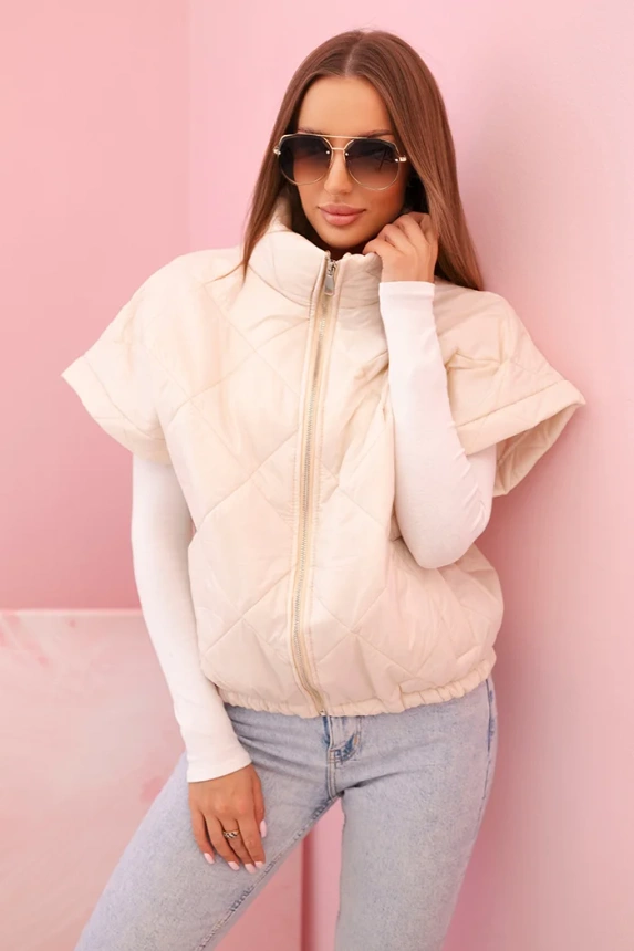 Women's quilted vest with short sleeves and a stand-up collar light beige