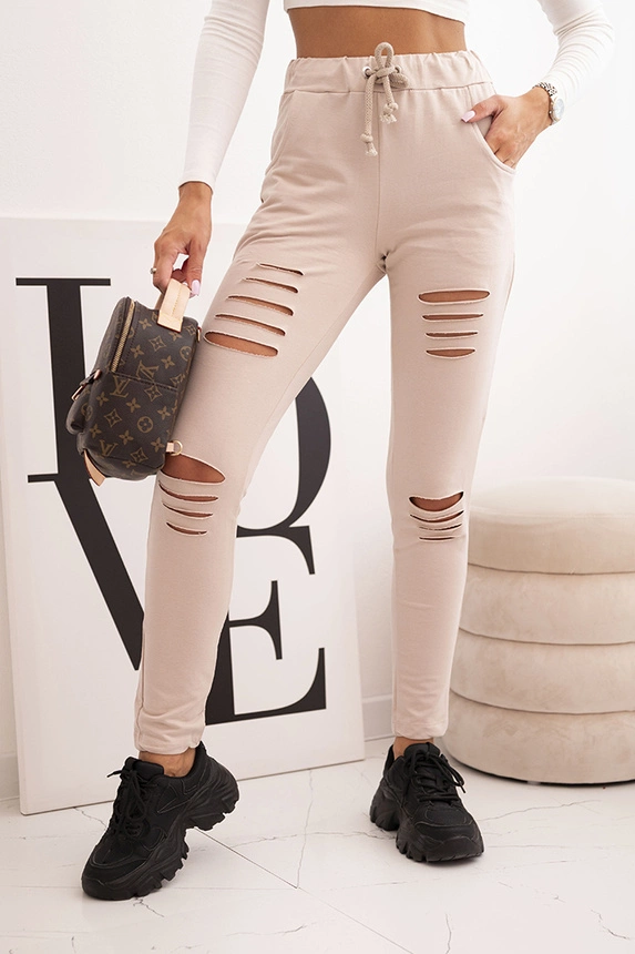 Damen Baumwollhosen mit Abnutzungen und Gummizug in der Taille beige