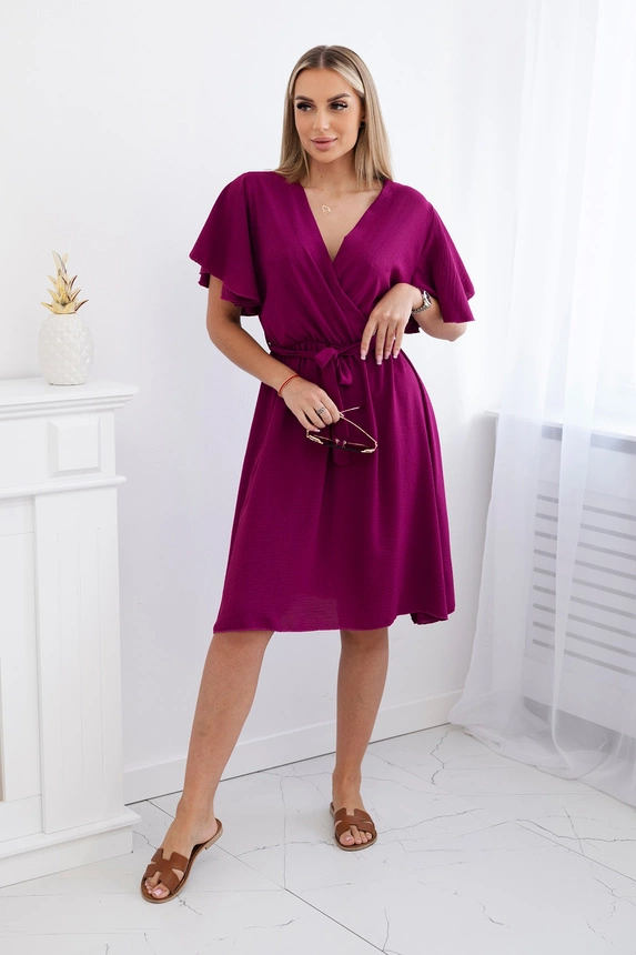 Dress with a plunging neckline plum