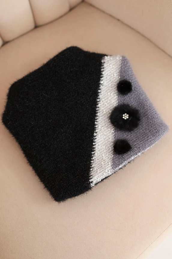 Elegant women's hat with fur decorations and a glittery band black