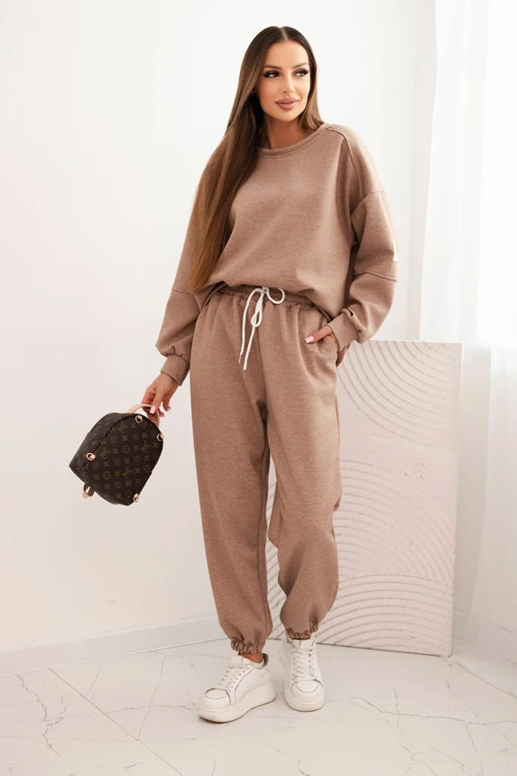 Ladies' butter set with a loose sweatshirt and pants with the inscription LOVE khaki