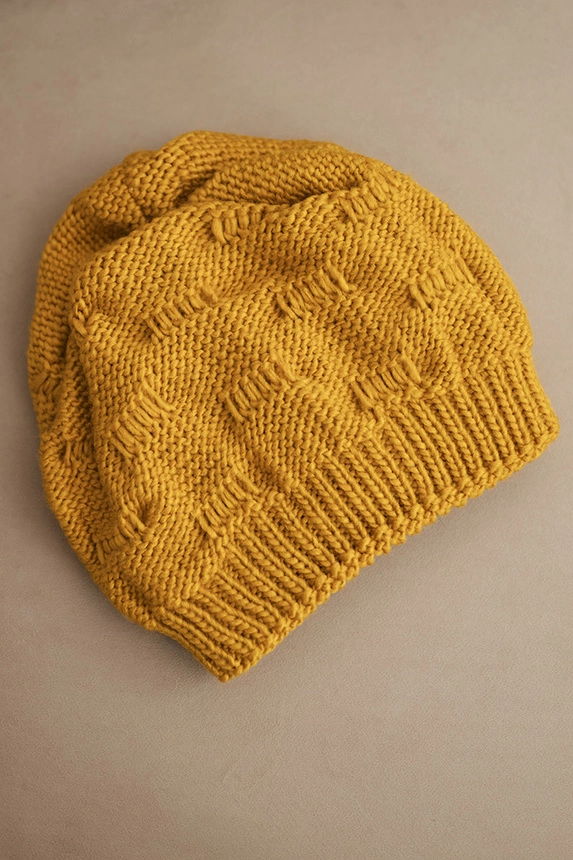 Women's winter hat made of wool with decorative weave K451 mustard
