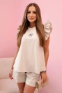 Women's set with a frill – a short-sleeved blouse and shorts with an elastic band beige