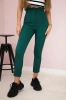 Creased trousers dark green