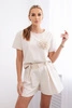 Новый комплект пунто с декоративным цветком блузка + шорты светло-бежевый