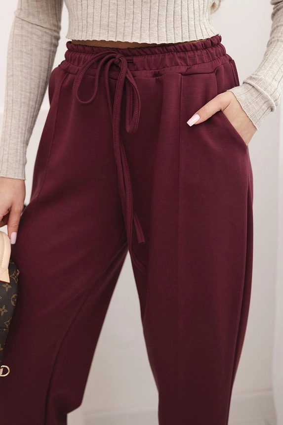 Elegant women's high-waisted trousers with a tie at the waist burgundy